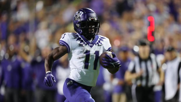 Sep 2, 2022; Boulder, Colorado, USA; TCU Horned Frogs wide receiver Derius Davis (11) carries the ball for a touchdown in the fourth quarter against the Colorado Buffaloes at Folsom Field. Mandatory Credit: Ron Chenoy-USA TODAY Sports